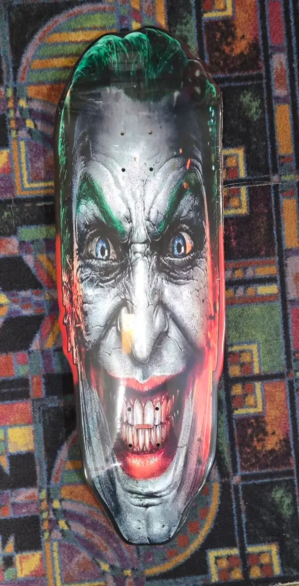 EVIL JOKER SHAPED SKATE DECK